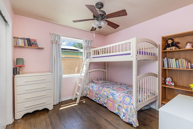 bedroom featuring dark hardwood / wood-style flooring and ceiling fan