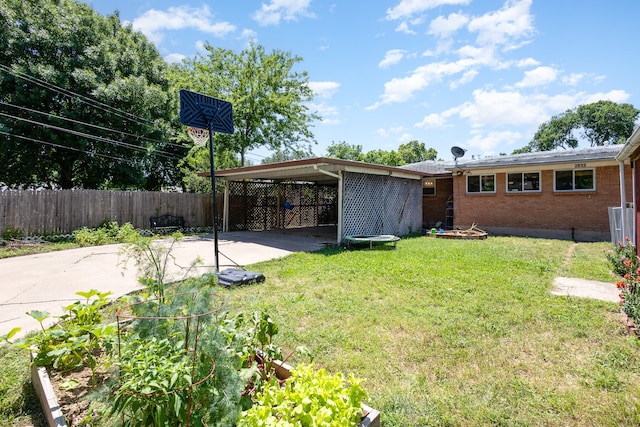 view of yard with a carport