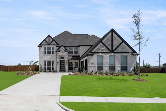 tudor house with a front yard