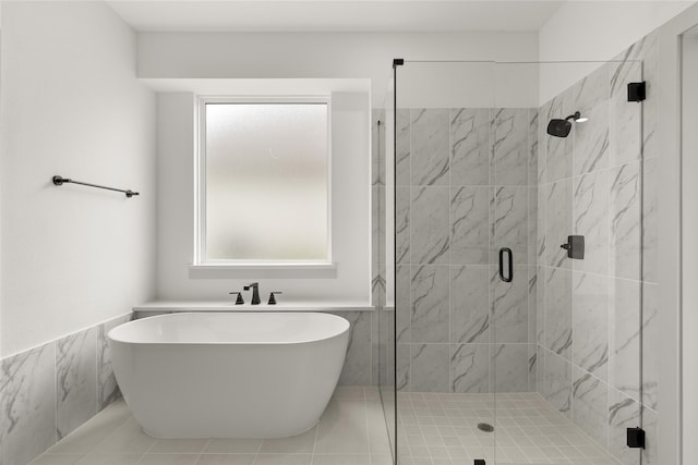 bathroom featuring tile patterned flooring and shower with separate bathtub