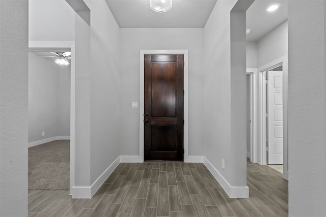 entrance foyer featuring light hardwood / wood-style floors and ceiling fan