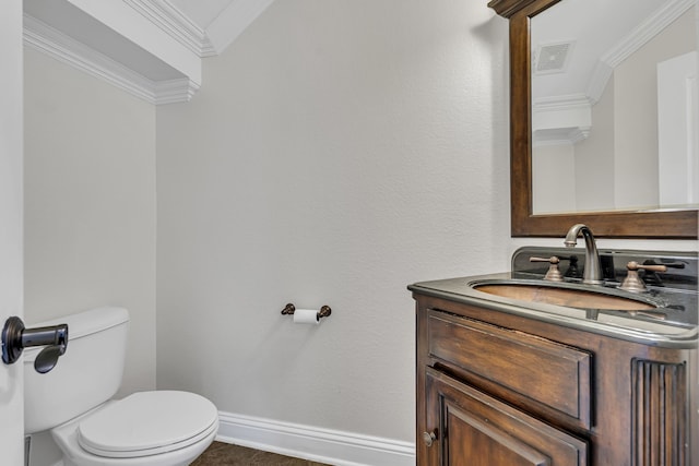 bathroom featuring oversized vanity, ornamental molding, and toilet