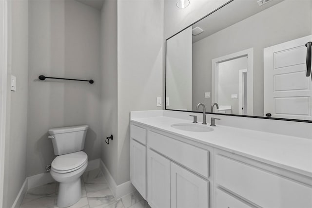 bathroom with marble finish floor, visible vents, toilet, vanity, and baseboards