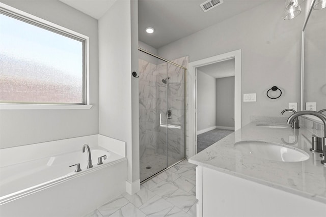 bathroom with a garden tub, a sink, visible vents, marble finish floor, and a marble finish shower