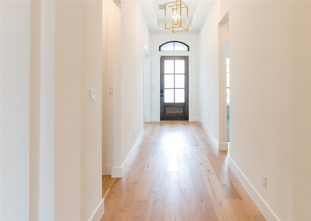 doorway to outside featuring light hardwood / wood-style floors