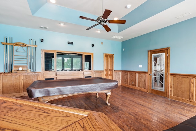 playroom with a raised ceiling, wood-type flooring, ceiling fan, and billiards