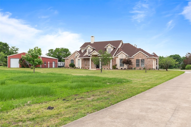 view of front of home featuring an outdoor structure and a garage