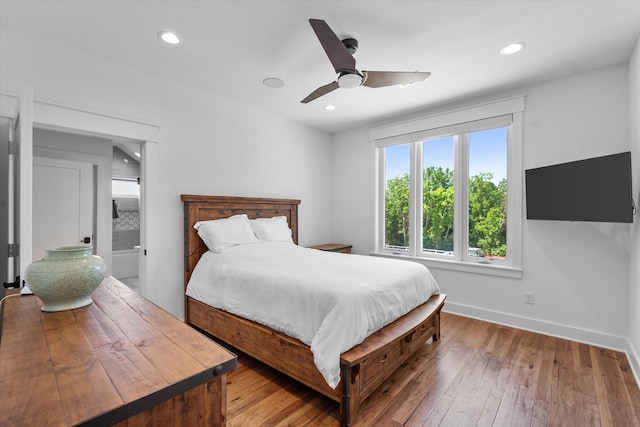 bedroom featuring ceiling fan and hardwood / wood-style floors