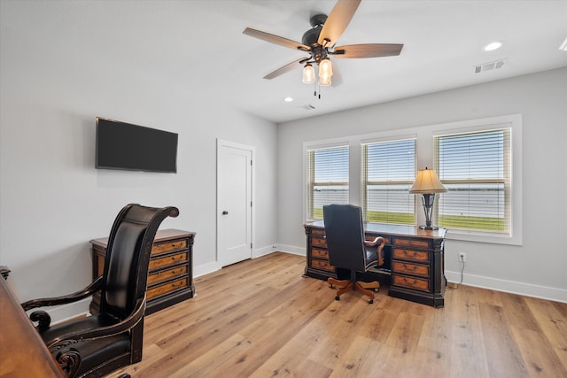 office area featuring light hardwood / wood-style floors and ceiling fan