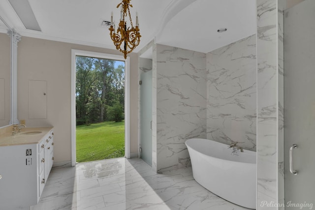 bathroom with a bathtub, vanity, tile walls, and ornamental molding