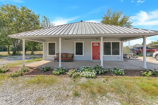 farmhouse-style home featuring covered porch