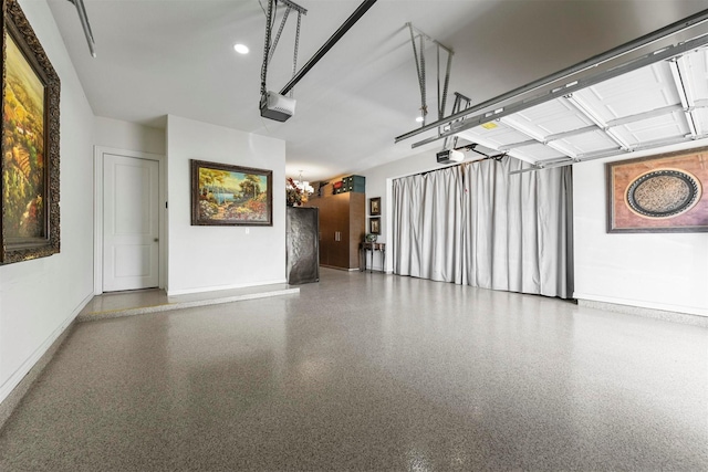 laundry room featuring cabinets, light tile patterned floors, and washing machine and dryer