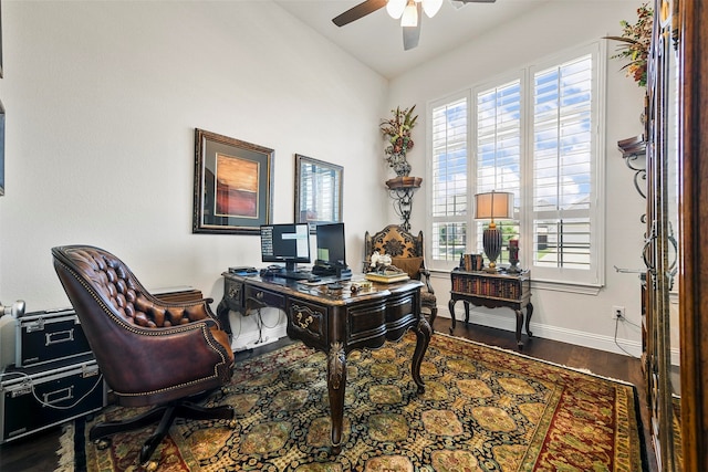 home office with hardwood / wood-style flooring, vaulted ceiling, and ceiling fan