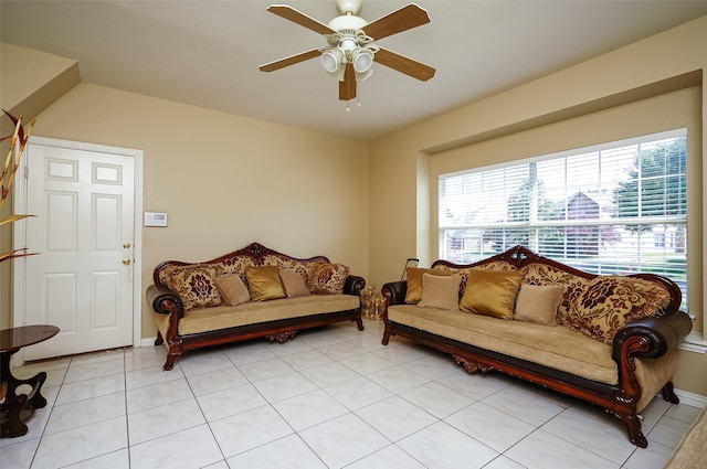 living room with ceiling fan and light tile floors