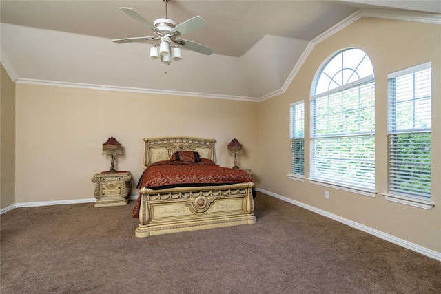 carpeted bedroom with crown molding, lofted ceiling, and ceiling fan