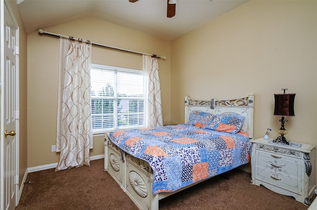 bedroom featuring dark carpet, ceiling fan, and lofted ceiling