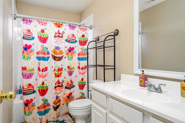 full bathroom featuring shower / bath combination with curtain, toilet, and vanity with extensive cabinet space