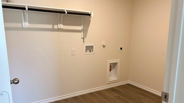 laundry area with hookup for an electric dryer, hookup for a gas dryer, dark hardwood / wood-style flooring, and washer hookup