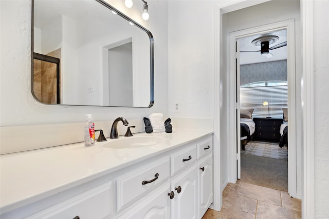 bathroom with tile floors and vanity