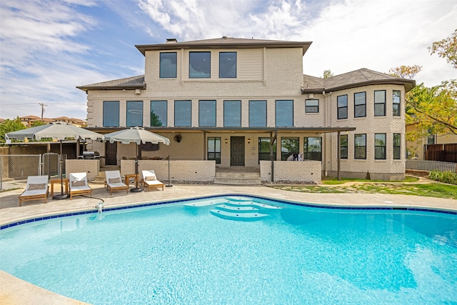 view of pool with a patio