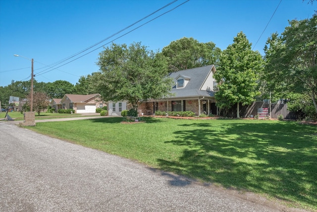 view of front of home featuring a front lawn