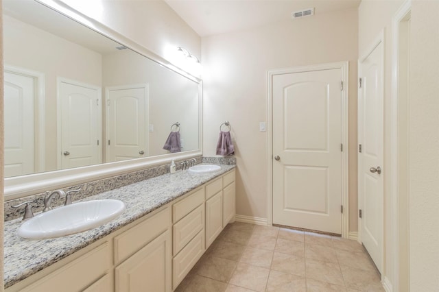 bathroom featuring vanity and tile patterned floors