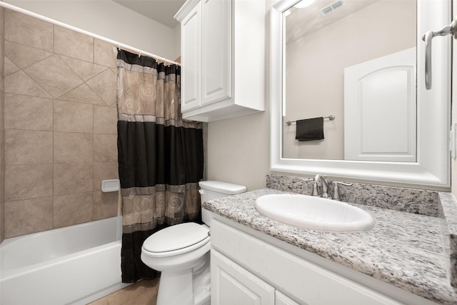 full bathroom featuring vanity, toilet, and shower / bath combo