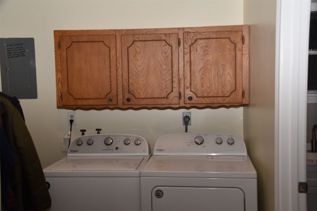 clothes washing area featuring washer and dryer, cabinets, washer hookup, and hookup for an electric dryer