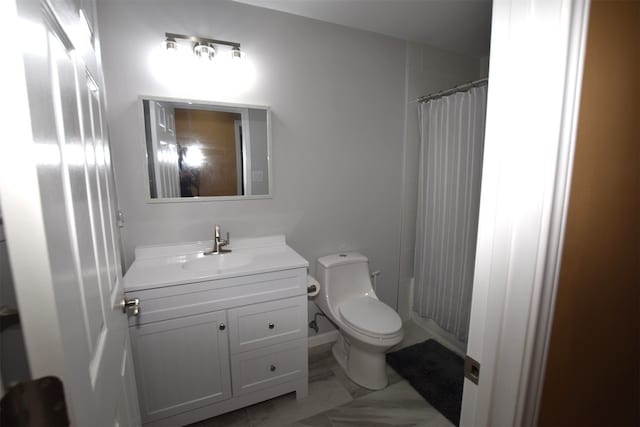 bathroom with tile flooring, oversized vanity, and toilet