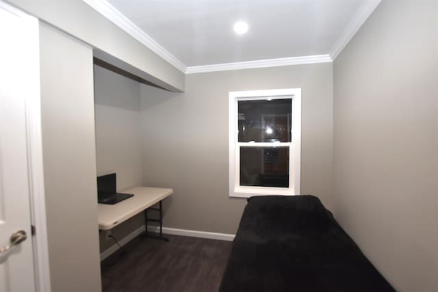 interior space featuring crown molding and dark hardwood / wood-style floors