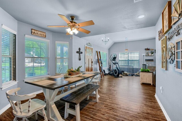 dining room featuring ceiling fan and dark wood-type flooring