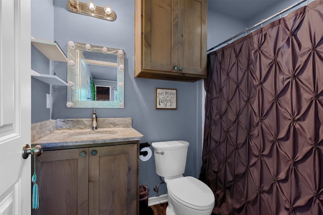 bedroom with ornamental molding, ceiling fan, hardwood / wood-style flooring, a spacious closet, and a closet