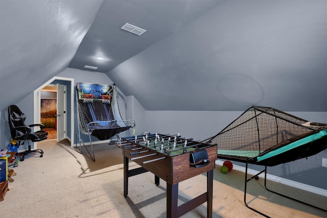 recreation room featuring carpet flooring and lofted ceiling