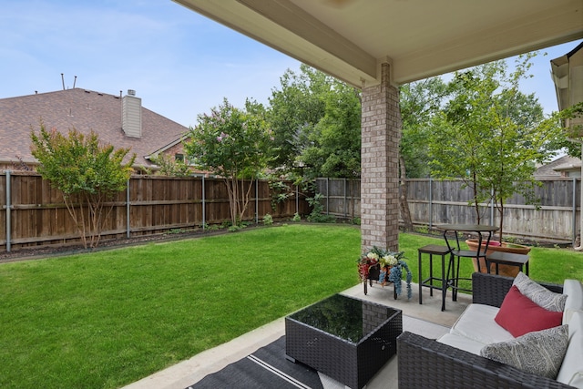 view of yard with a patio area and an outdoor living space