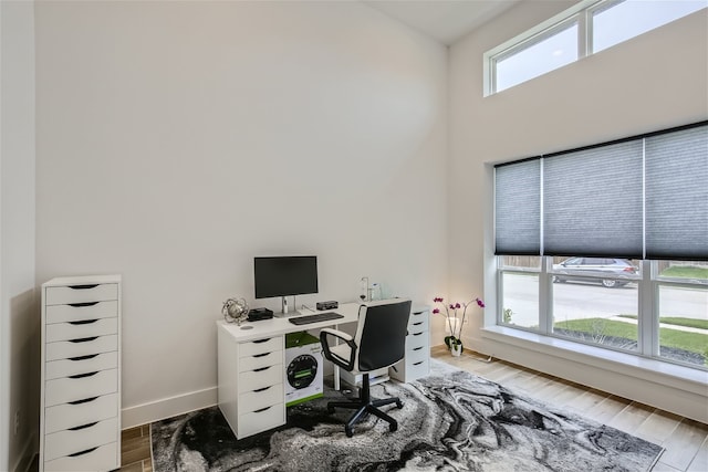 home office featuring hardwood / wood-style floors