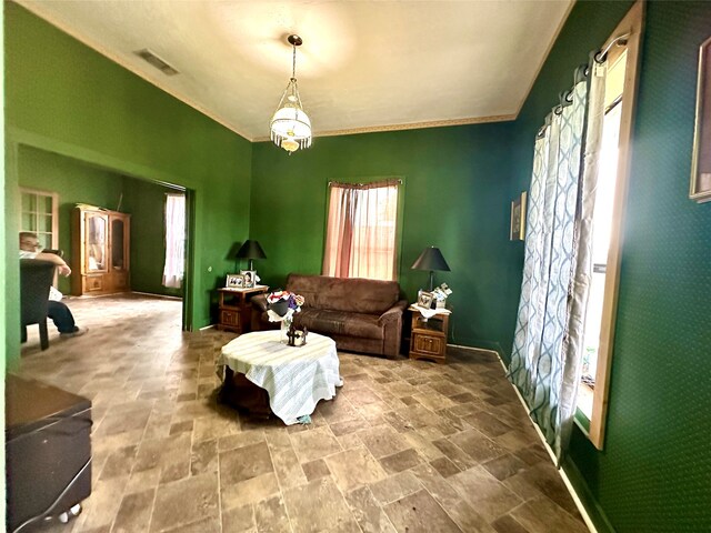 living room with ornamental molding