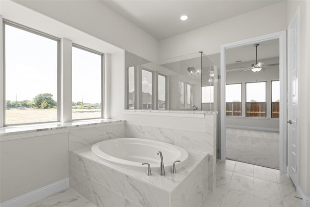 bathroom with ceiling fan, shower with separate bathtub, and tile patterned floors