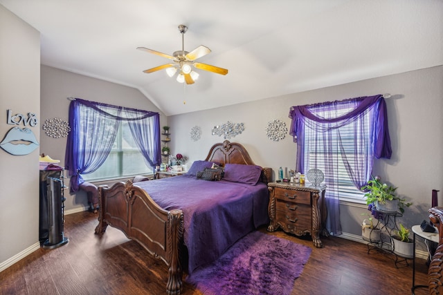 bedroom with ceiling fan, dark hardwood / wood-style floors, and lofted ceiling