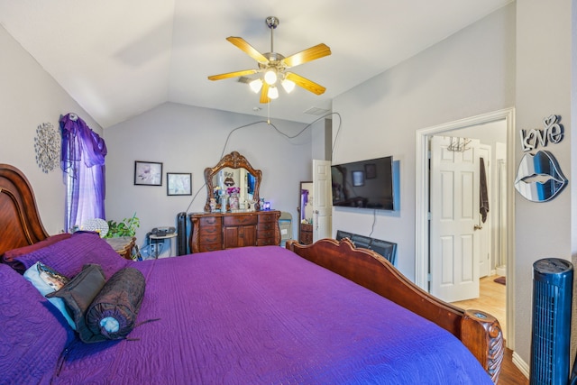 bedroom featuring wood-type flooring, ceiling fan, and vaulted ceiling