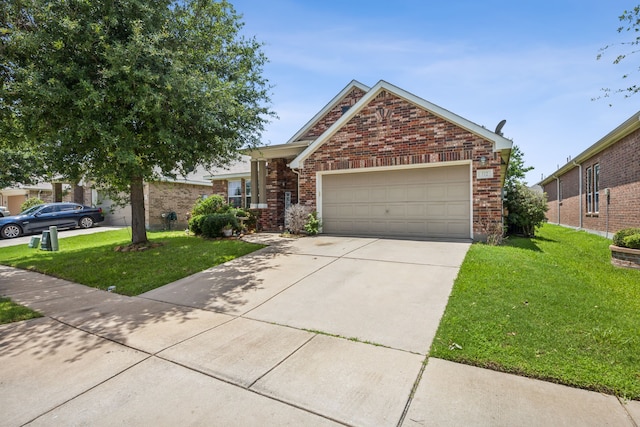 view of front facade with a garage and a front yard