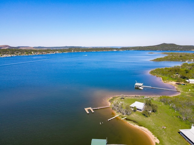 bird's eye view featuring a water and mountain view