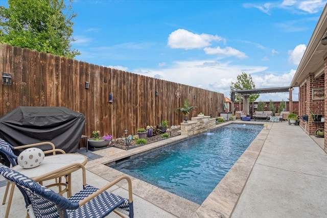 view of swimming pool featuring grilling area, a pergola, a patio area, and pool water feature