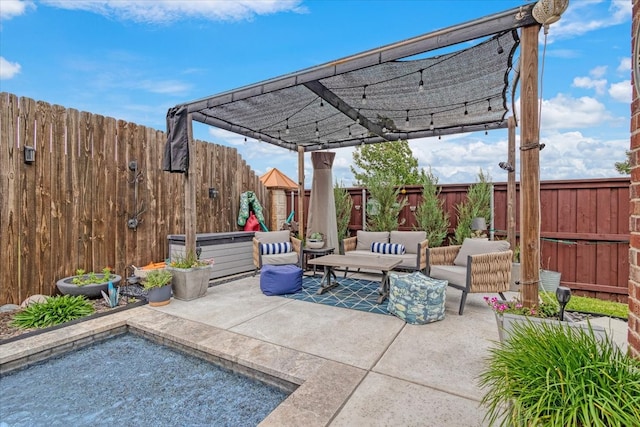 view of patio featuring an outdoor hangout area and a pergola