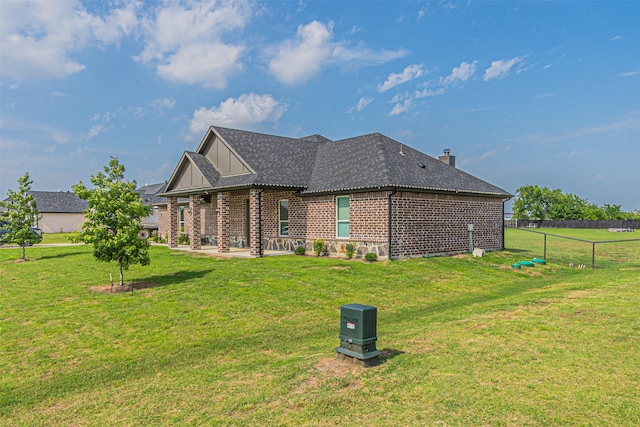 view of property exterior featuring a yard