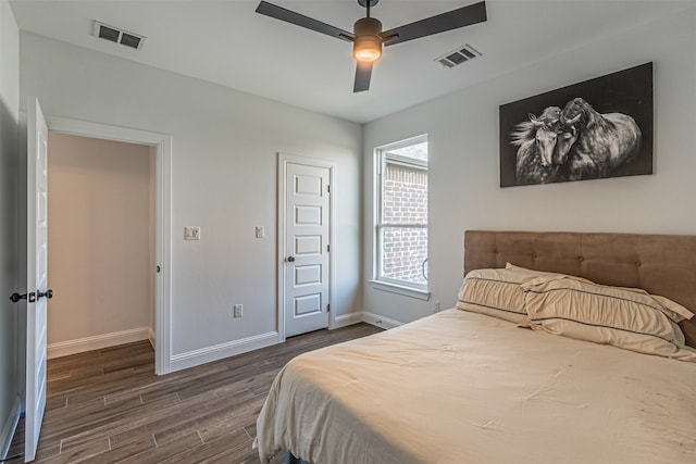 bedroom featuring dark wood-type flooring and ceiling fan