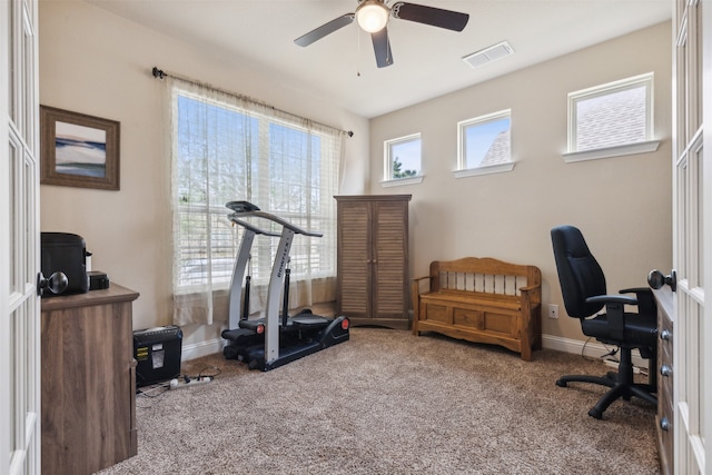 home office featuring carpet and ceiling fan