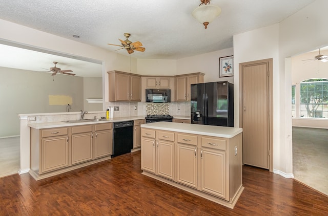 kitchen featuring black appliances, ceiling fan, dark hardwood / wood-style floors, and a kitchen island