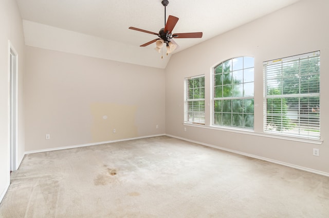 unfurnished room featuring ceiling fan, a healthy amount of sunlight, and carpet flooring