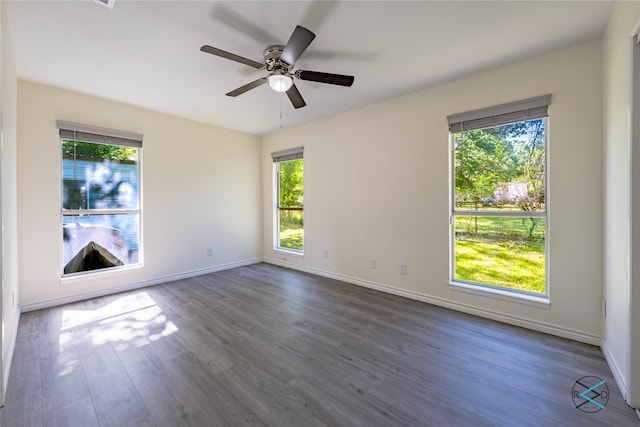 unfurnished room with ceiling fan and hardwood / wood-style flooring