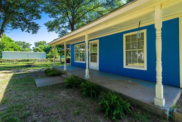 back of house with a porch